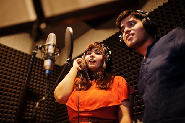 Music studio setup showing microphone and equipment for professional singing training